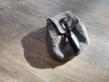 Load image into Gallery viewer, Necklace satchel on gray wood background. Dusk. 